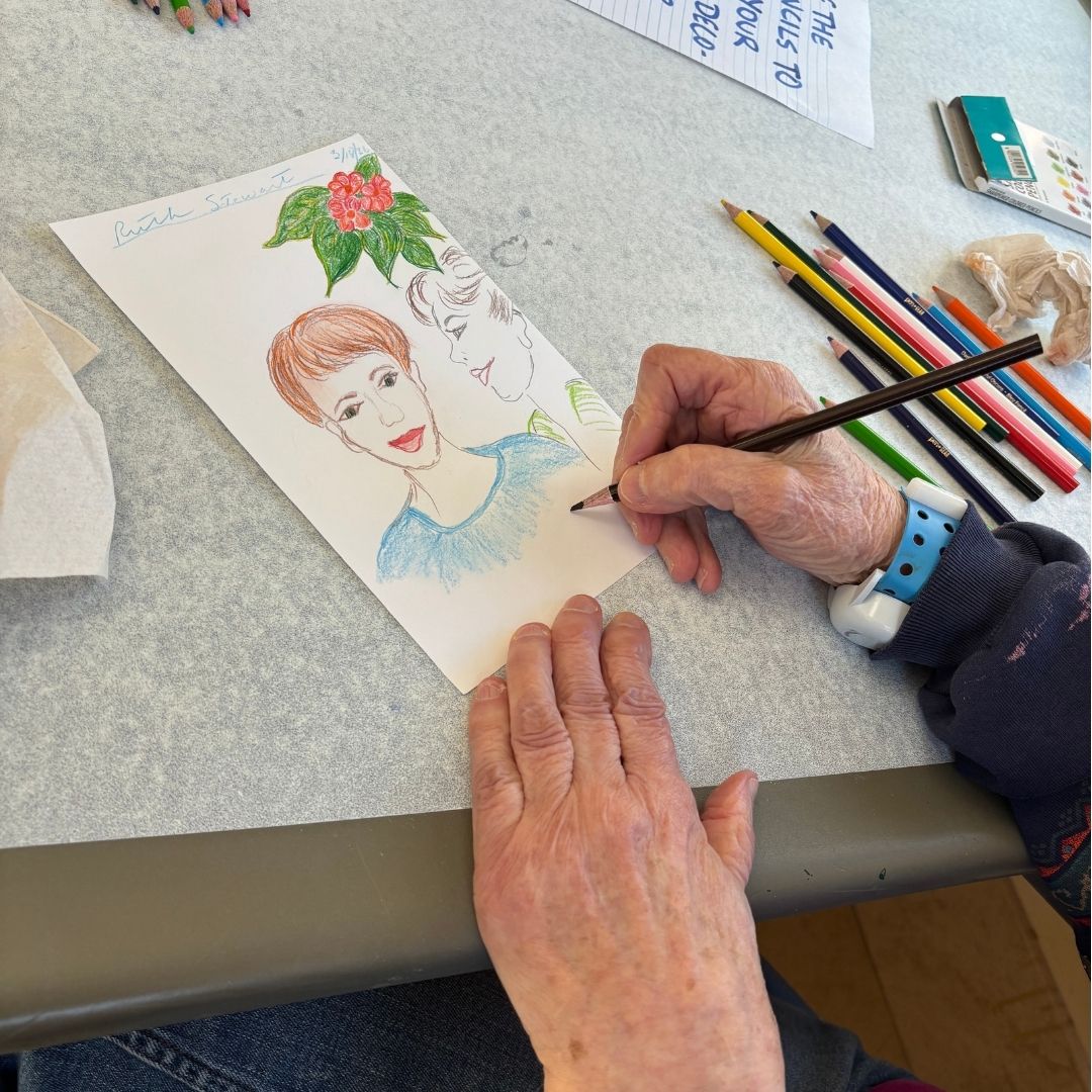 Picture of an older person drawing